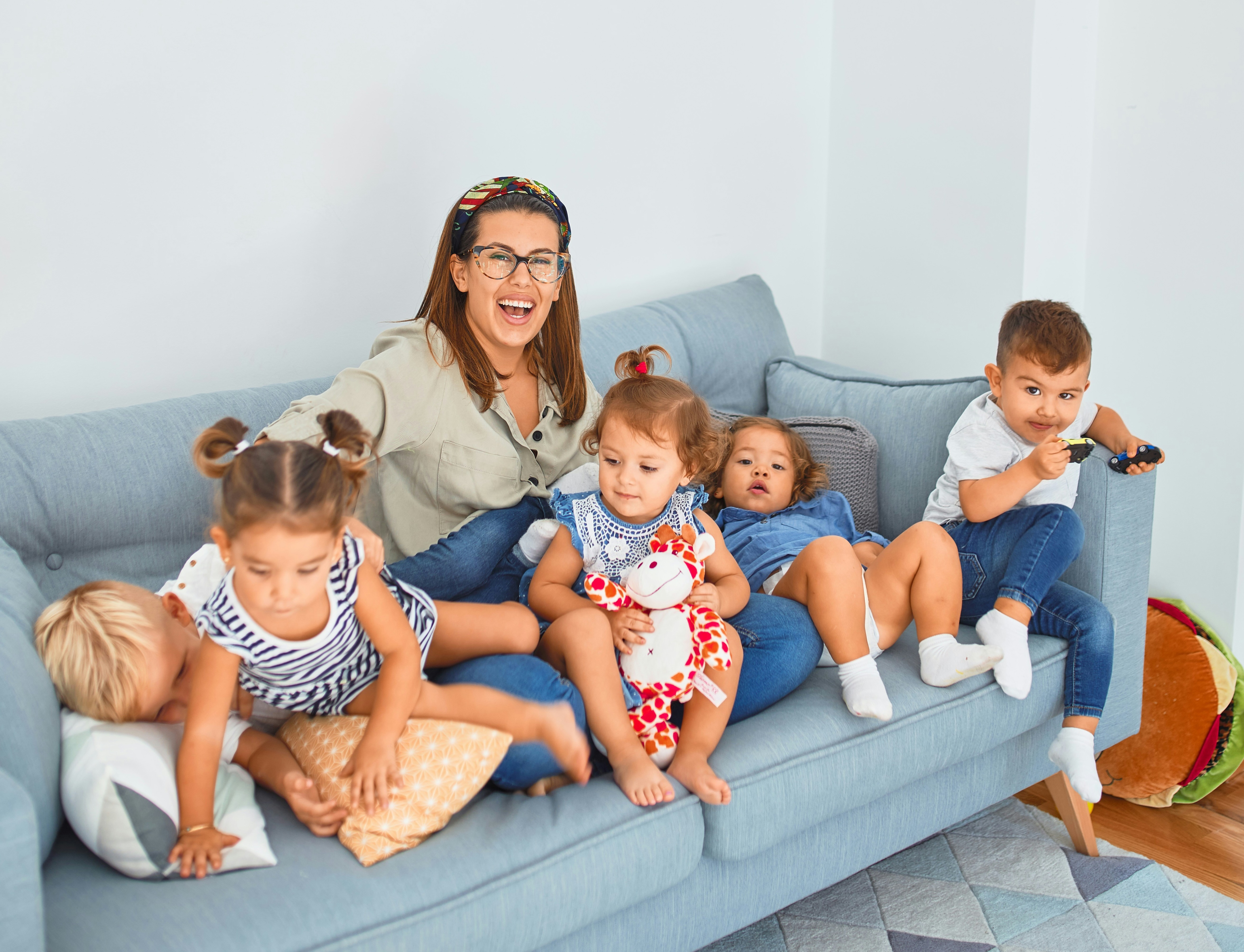 Warm, nurturing environment — educator with children at Bloom